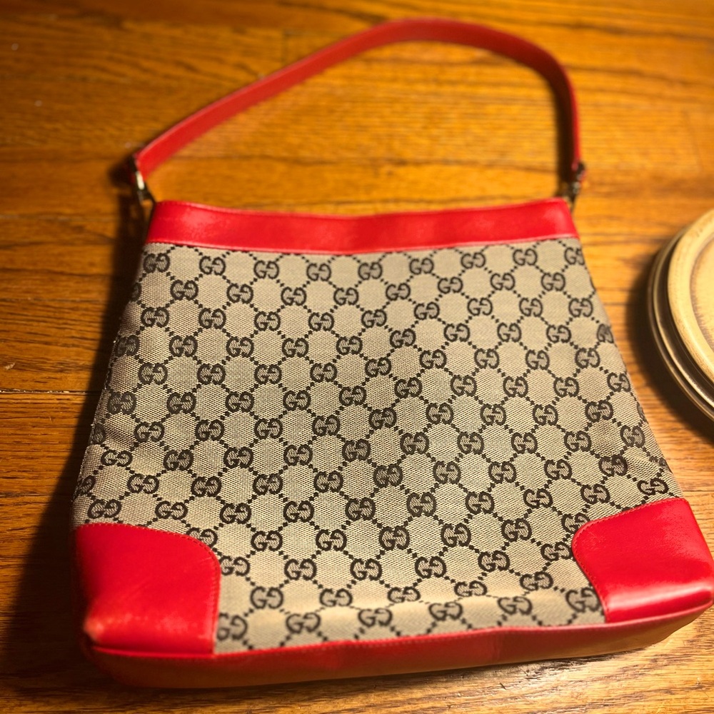 EUC Gucci GG Red trimmed Canvas Handbag.